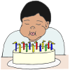 He+is+blowing+out+his+candles. Picture