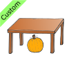 The pumpkin ins UNDER the table.
